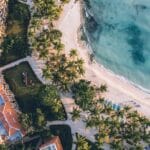 All inclusive Caribbean honeymoon resort with private beach, overwater villa, and turquoise water
