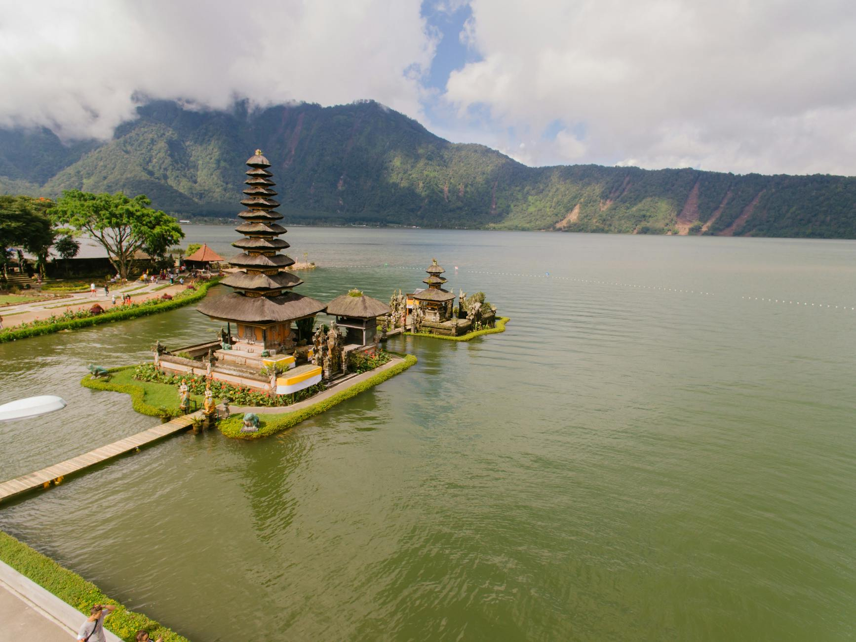 Stunning aerial view of Pura Ulun Danu Bratan Temple situated by serene lake in Bali