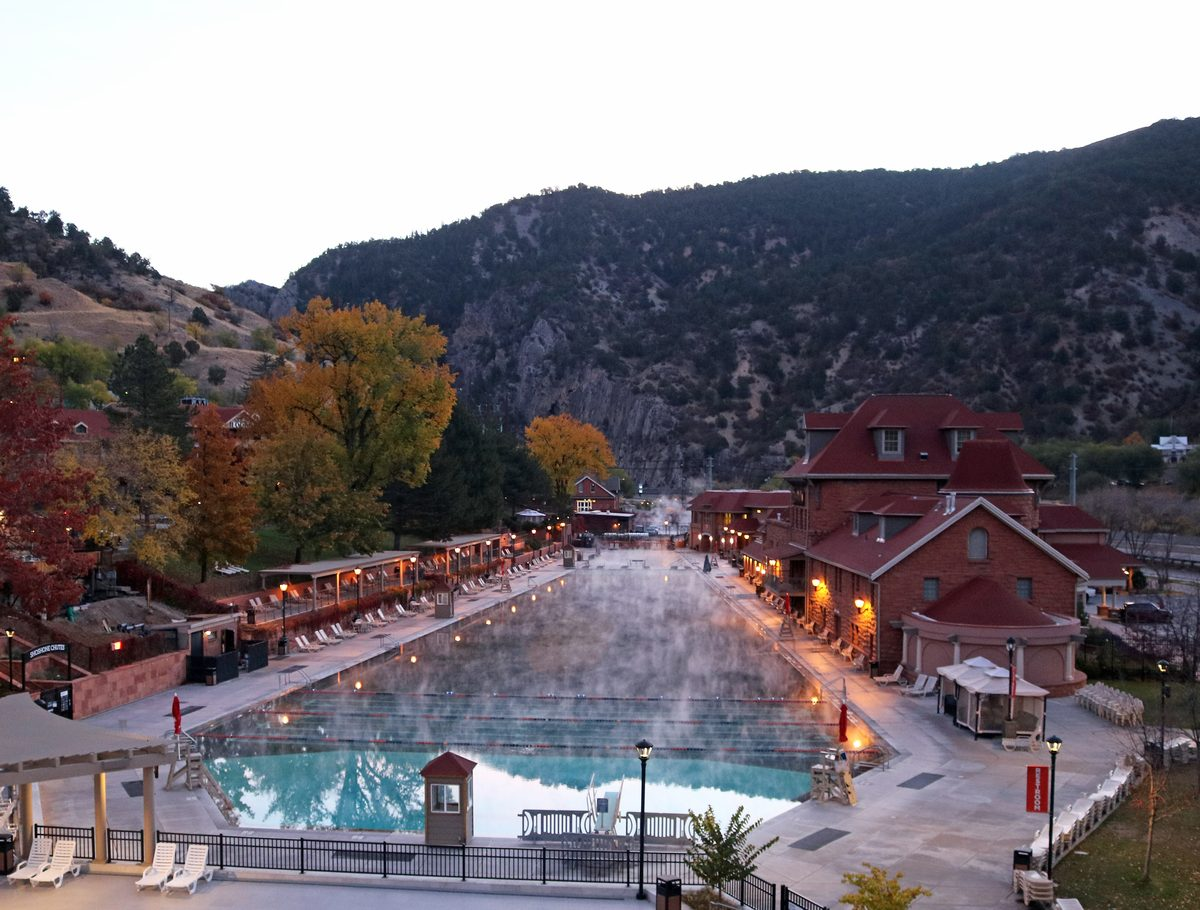The historic Glenwood Hot Springs pool and lodge in Colorado at dusk