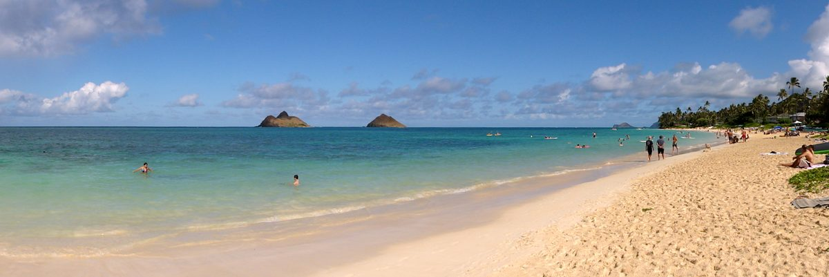 Turquoise water and white sand at Lanikai Beach, Oahu, with the Mokulua islands offshore