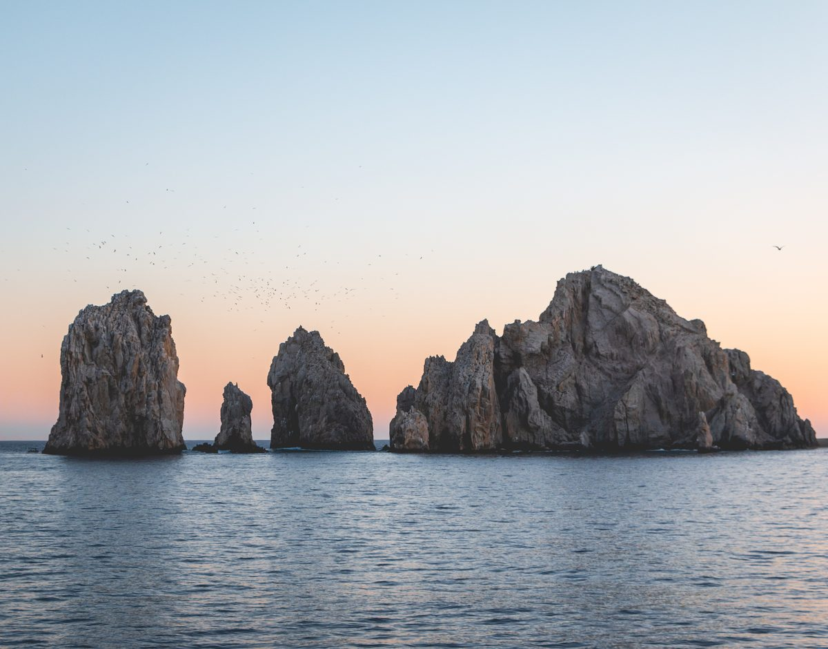 The Land's End rock formations at Los Cabos, Mexico, at sunset