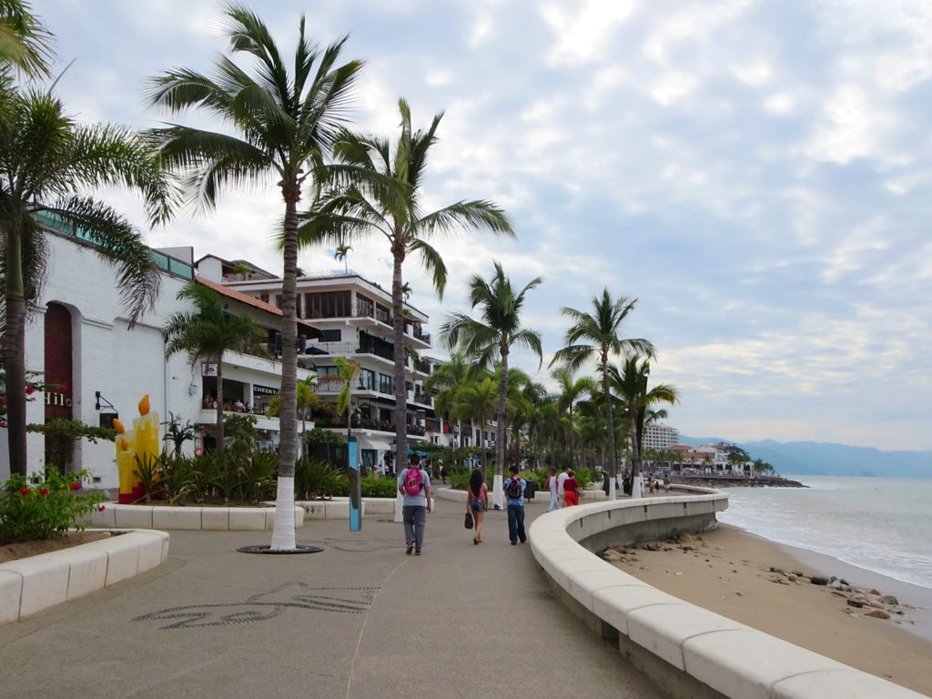The palm-lined Malecon boardwalk along the beach in Puerto Vallarta, Mexico