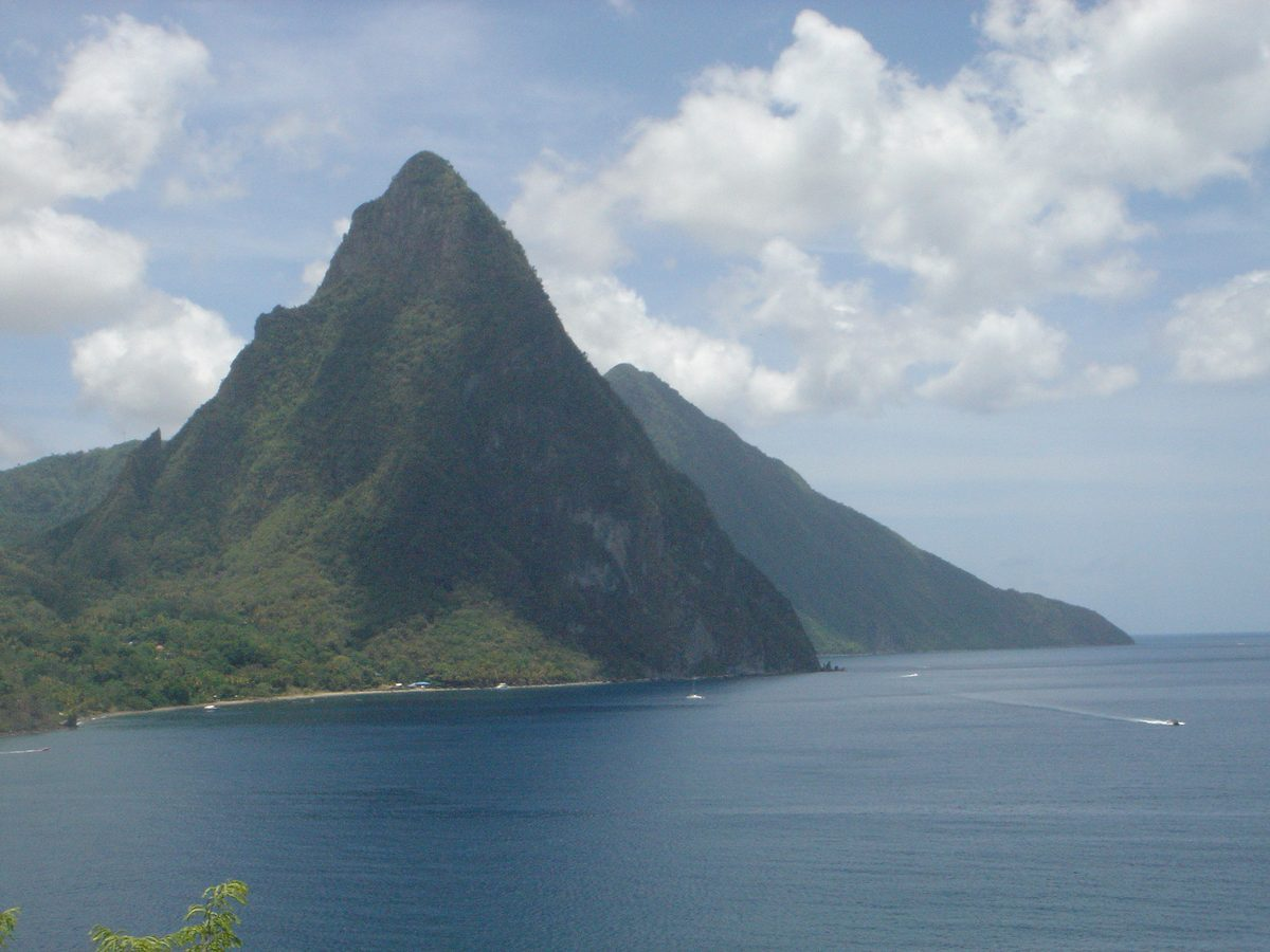 The Pitons rising over the coast of Saint Lucia, Caribbean